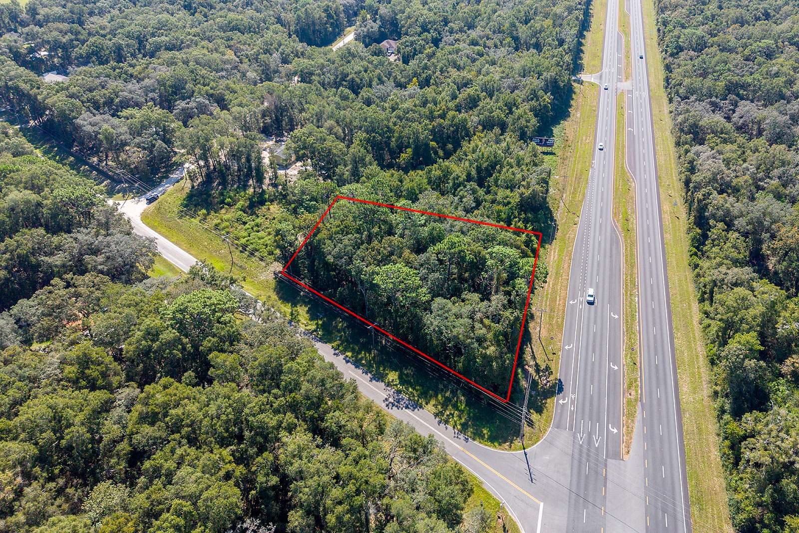 0.91 Acres of Commercial Land for Sale in Chiefland, Florida