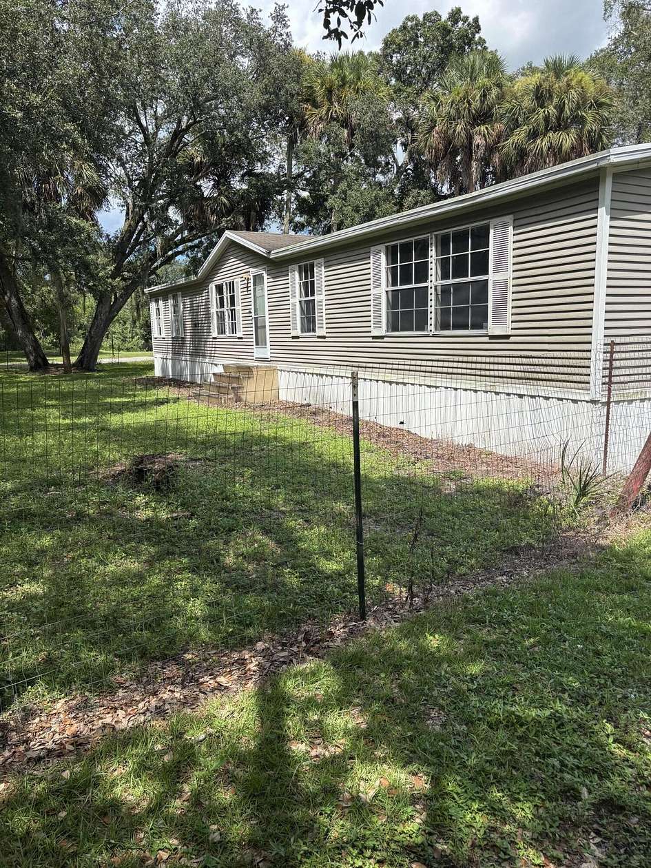 1.57 Acres of Land with Home for Sale in Clewiston, Florida