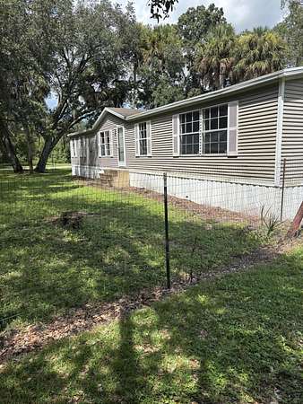1.57 Acres of Land with Home for Sale in Clewiston, Florida