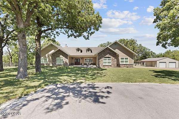 16.2 Acres of Recreational Land with Home for Sale in Joplin, Missouri