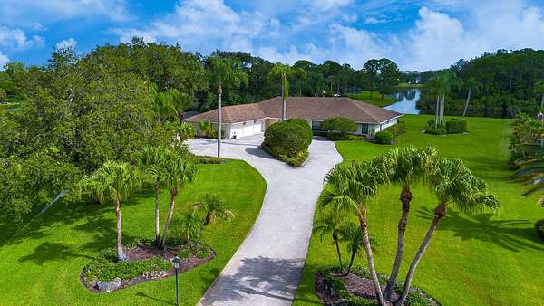 1.52 Acres of Land with Home for Sale in Palm City, Florida