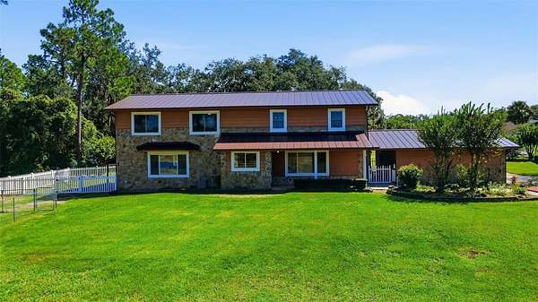 2 Acres of Land with Home for Sale in Chuluota, Florida