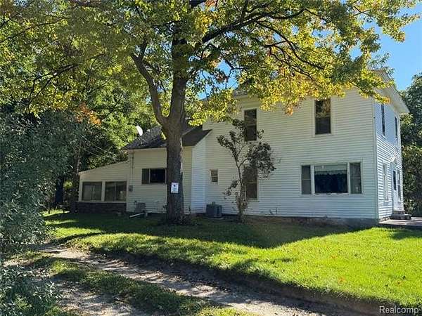 6.8 Acres of Land with Home for Sale in Groveland Township, Michigan