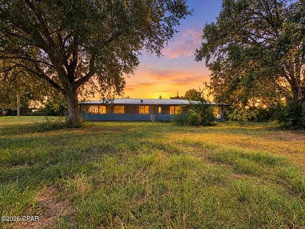 2.17 Acres of Land with Home for Sale in Altha, Florida