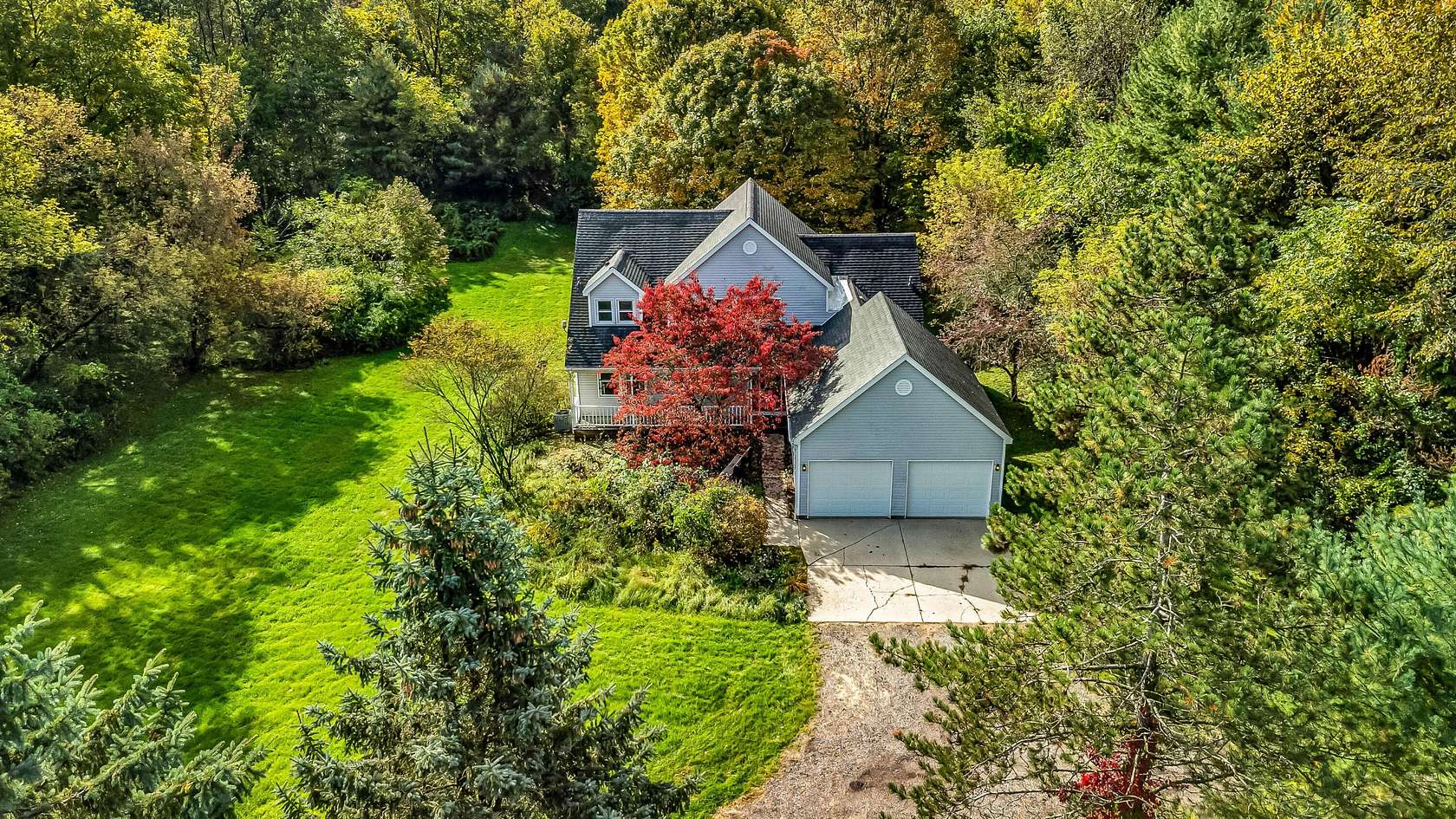 10 Acres of Land with Home for Sale in Lowell, Michigan