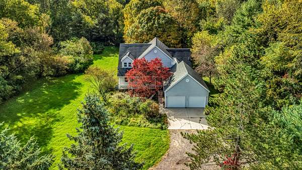 10 Acres of Land with Home for Sale in Lowell, Michigan