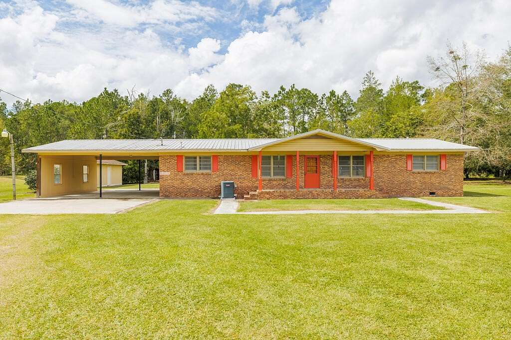 7.7 Acres of Land with Home for Sale in Adel, Georgia