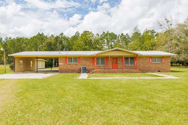 7.7 Acres of Land with Home for Sale in Adel, Georgia