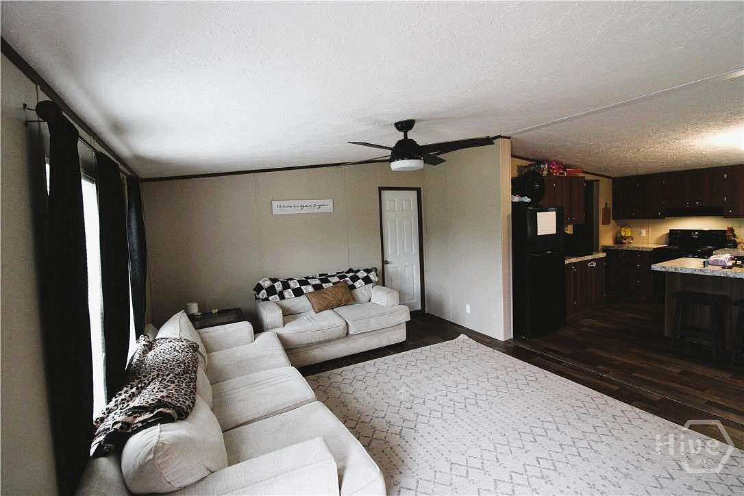 3.27 Acres of Land with Home for Sale in Twin City, Georgia