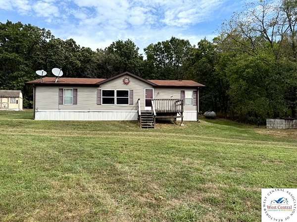 18.4 Acres of Recreational Land with Home for Sale in Edwards, Missouri