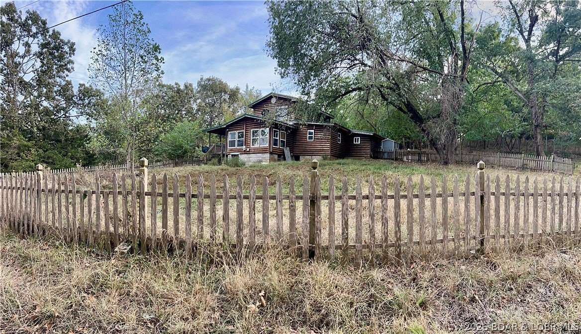 1.6 Acres of Land with Home for Sale in Climax Springs, Missouri