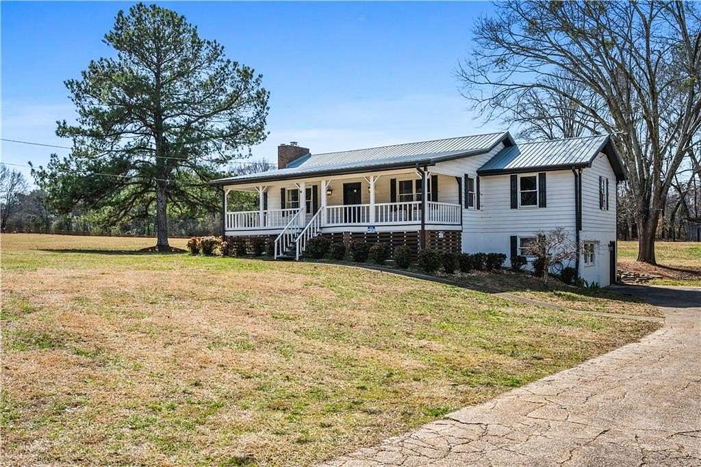 4.42 Acres of Land with Home for Sale in Powder Springs, Georgia