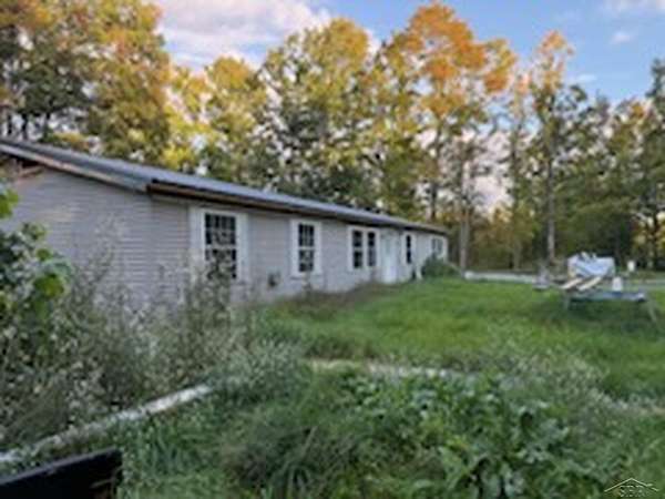 10.3 Acres of Recreational Land with Home for Sale in Frederic, Michigan