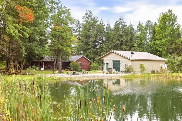 160 Acres of Recreational Land with Home for Sale in West Branch, Michigan