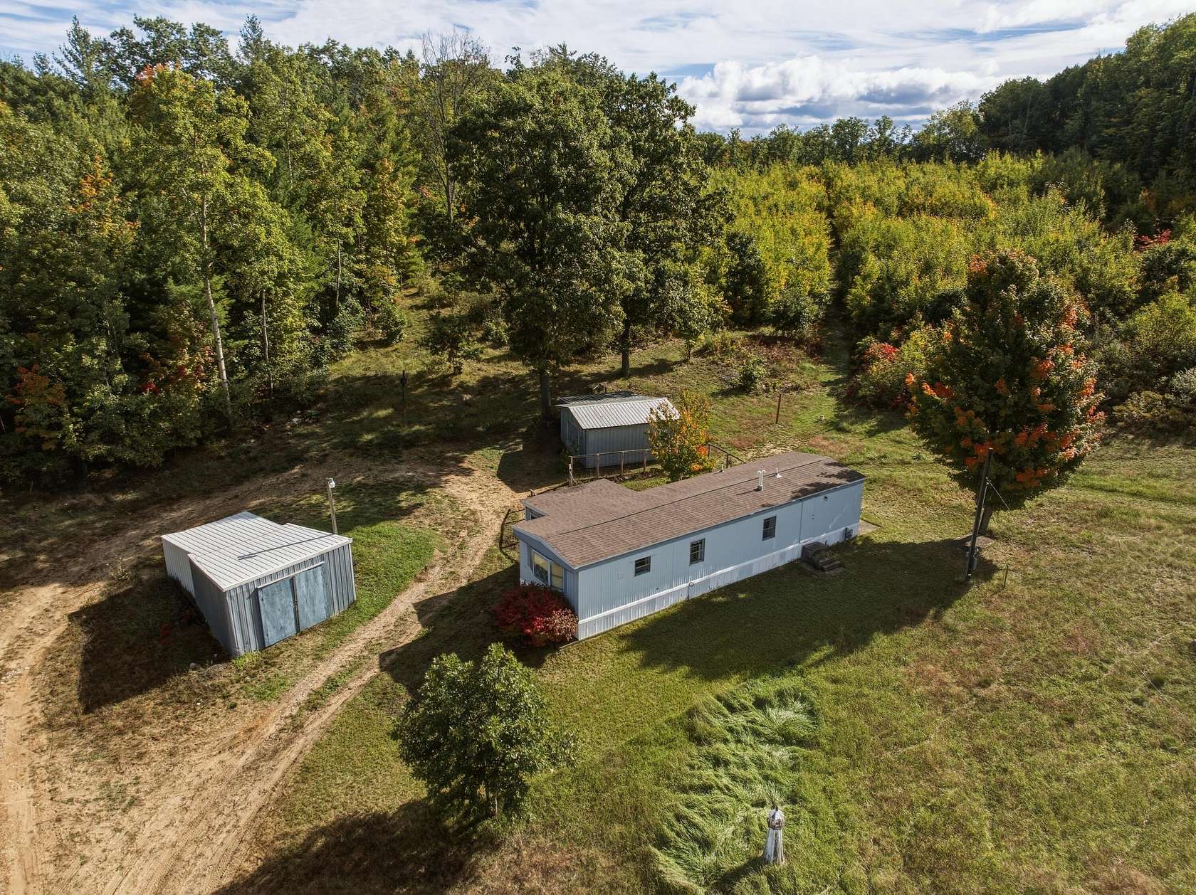 10 Acres of Recreational Land with Home for Sale in Barryton, Michigan