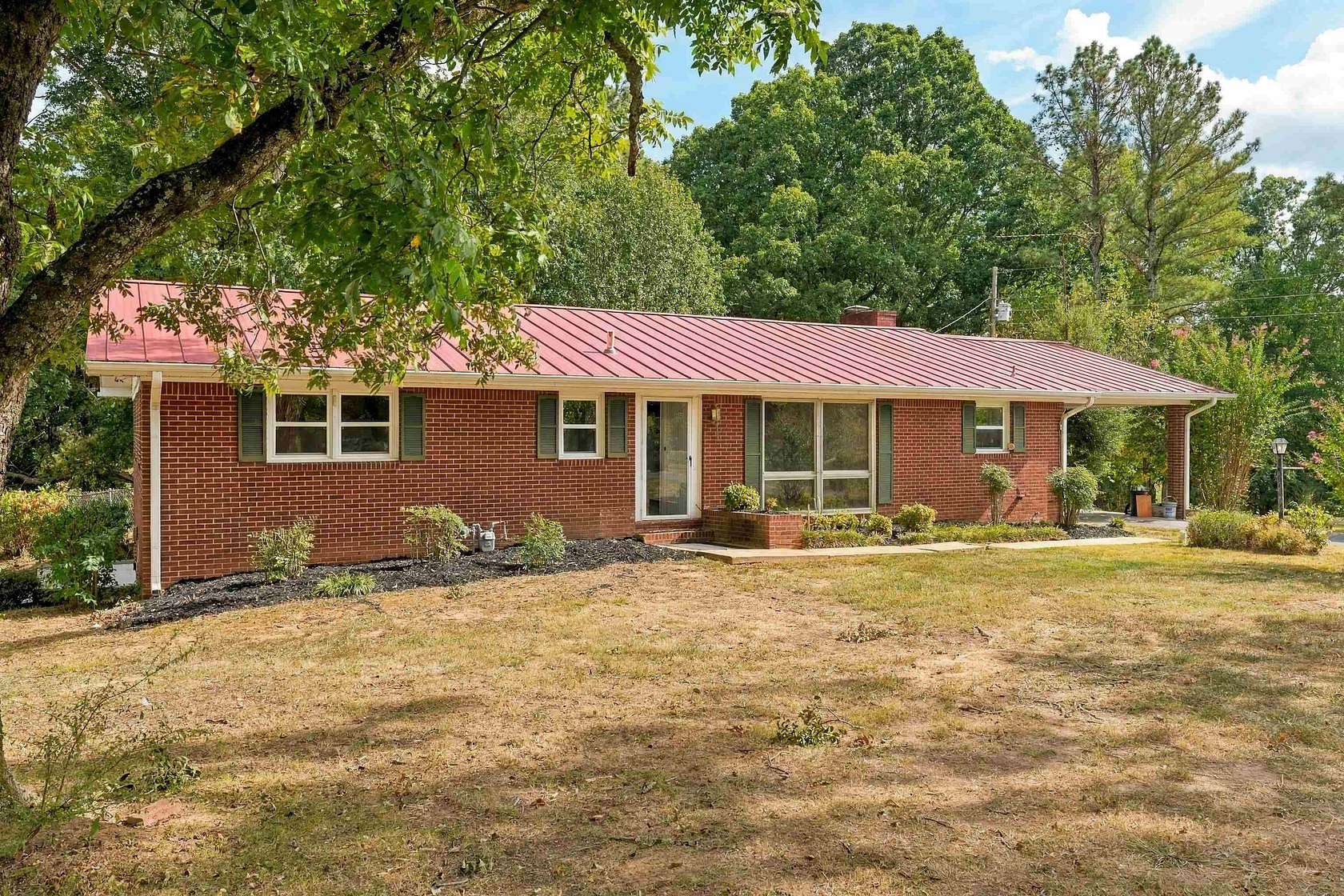 9.8 Acres of Land with Home for Sale in Tuscumbia, Alabama