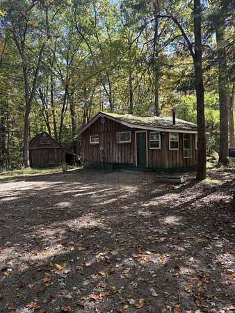 5.59 Acres of Land with Home for Sale in Moultonborough, New Hampshire