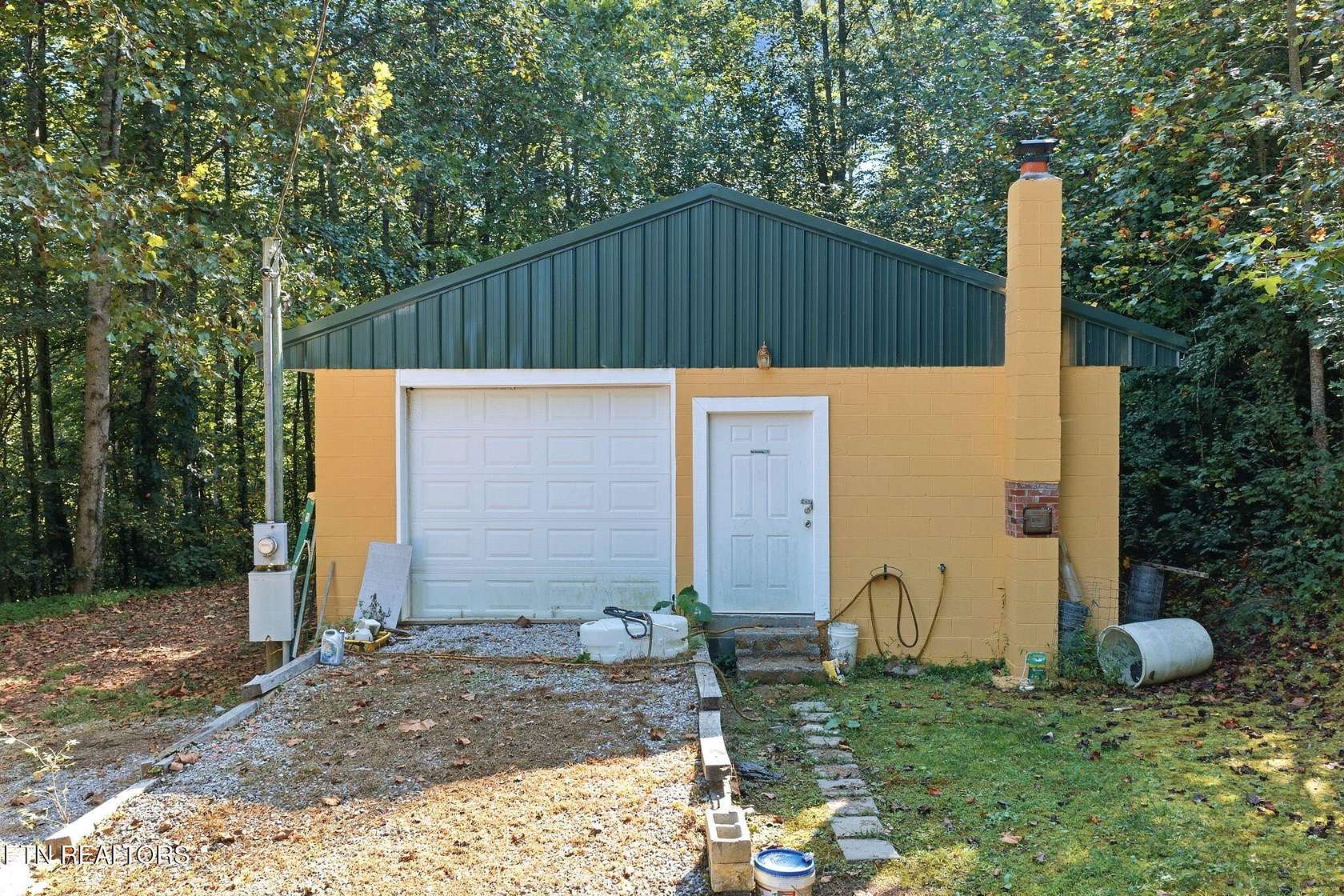 54.7 Acres of Recreational Land with Home for Sale in Briceville, Tennessee