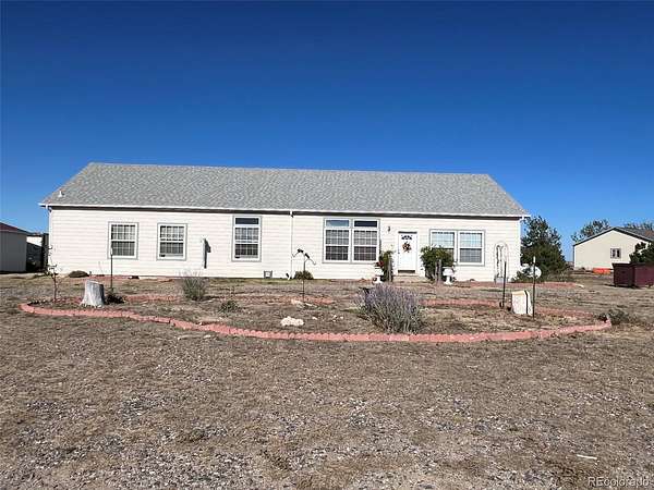 2.24 Acres of Land with Home for Sale in Wiggins, Colorado