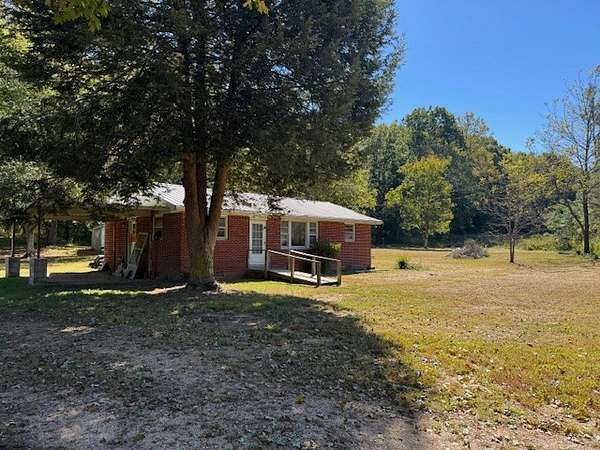 6 Acres of Land with Home for Auction in Centerville, Tennessee