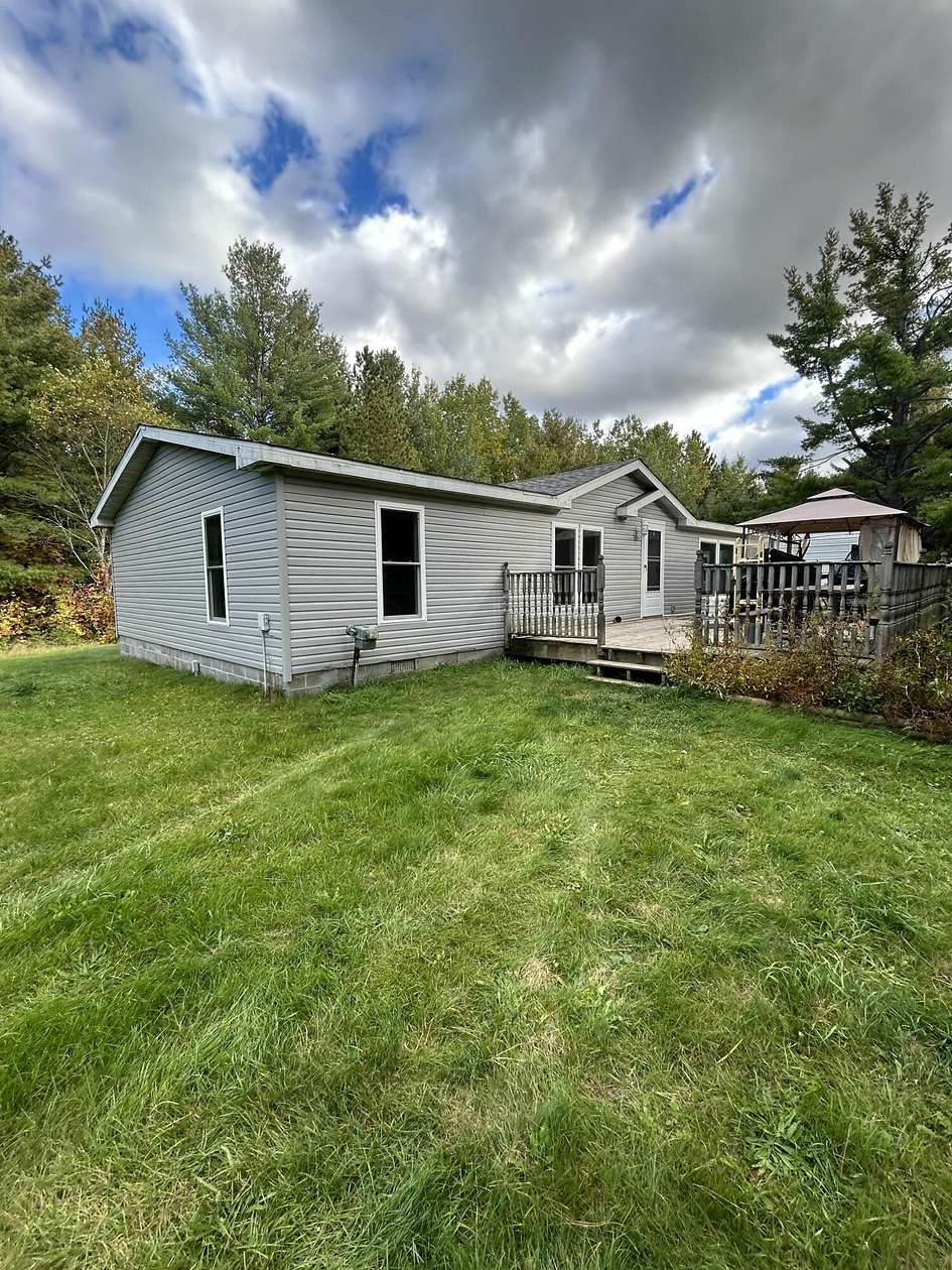 9.8 Acres of Land with Home for Sale in Onaway, Michigan