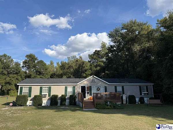 4.4 Acres of Land with Home for Sale in Dillon, South Carolina