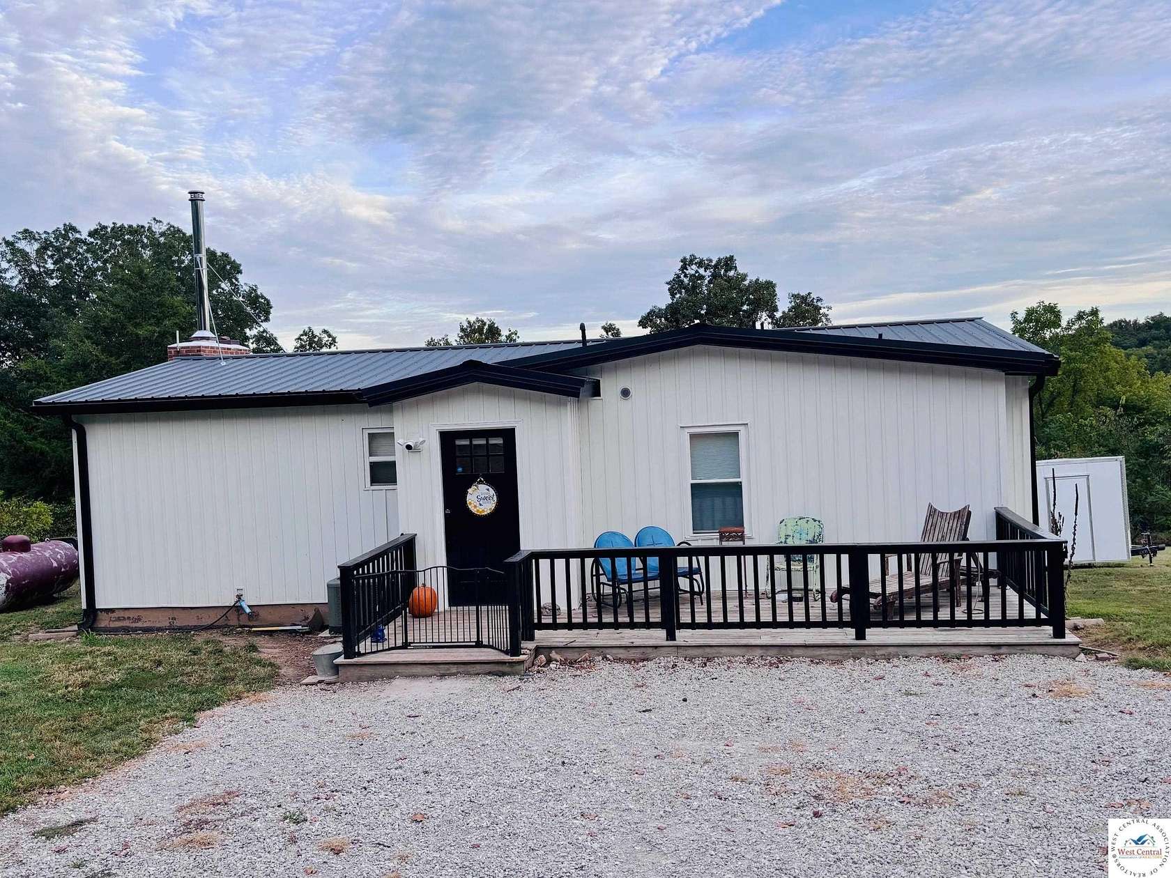 6.58 Acres of Land with Home for Sale in Lincoln, Missouri