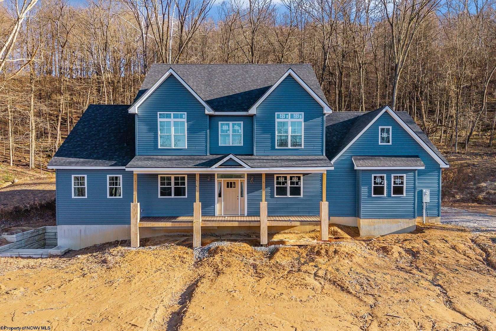11.2 Acres of Land with Home for Sale in Grafton, West Virginia