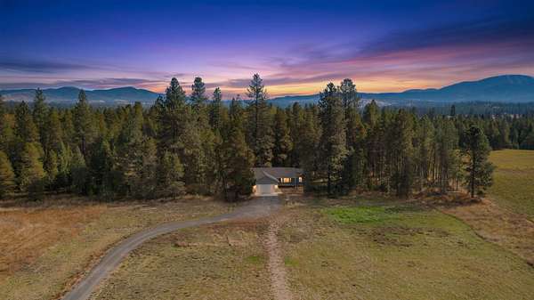 10.1 Acres of Land with Home for Sale in Elk, Washington