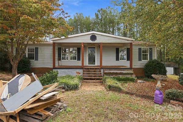 8.74 Acres of Land with Home for Sale in Mill Spring, North Carolina