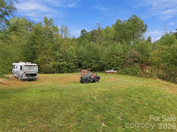 8.74 Acres of Land with Home for Sale in Mill Spring, North Carolina