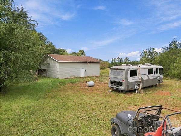 8.74 Acres of Land with Home for Sale in Mill Spring, North Carolina