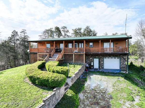 8.42 Acres of Land with Home for Sale in Sevierville, Tennessee