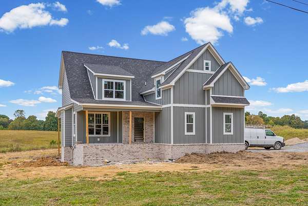 5 Acres of Land with Home for Sale in Cunningham, Tennessee