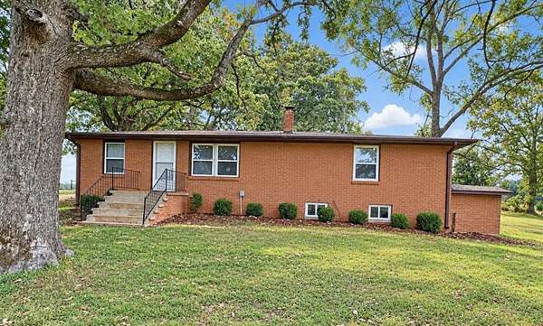 40 Acres of Agricultural Land with Home for Sale in Alton, Missouri