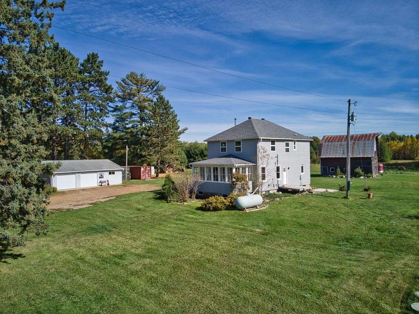 32.5 Acres of Agricultural Land with Home for Sale in Bovey, Minnesota