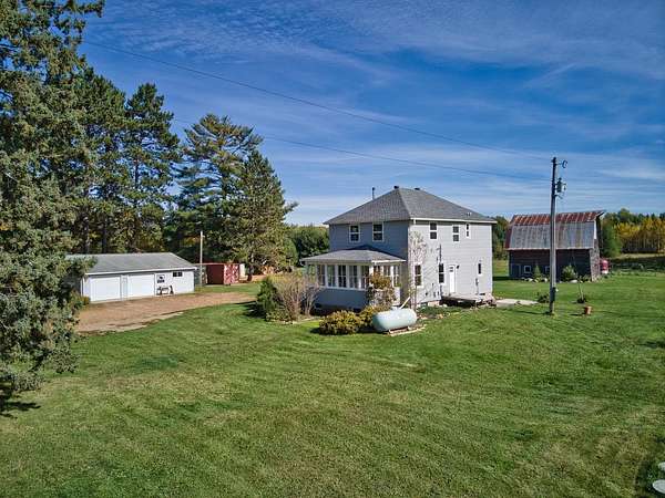 32.5 Acres of Agricultural Land with Home for Sale in Bovey, Minnesota