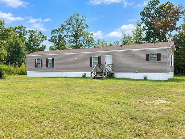 3 Acres of Land with Home for Sale in Adamsville, Tennessee