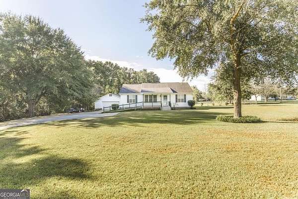 2.32 Acres of Land with Home for Sale in Byron, Georgia