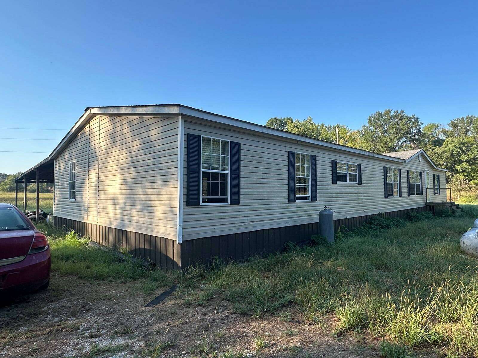 43 Acres of Land with Home for Sale in Strawberry, Arkansas