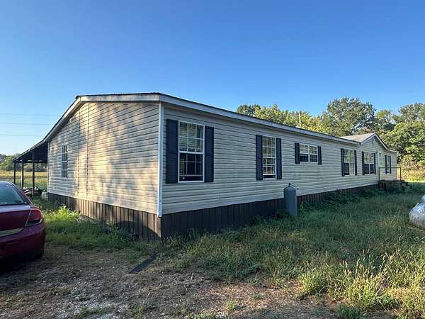 43 Acres of Land with Home for Sale in Strawberry, Arkansas