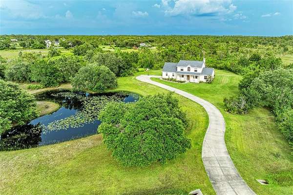 9.56 Acres of Land with Home for Sale in Myakka City, Florida