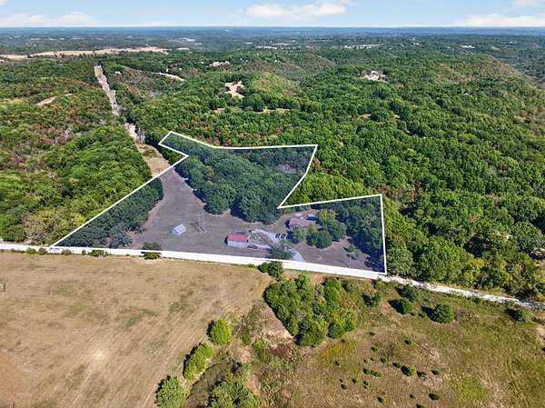 10 Acres of Land with Home for Sale in Reeds Spring, Missouri