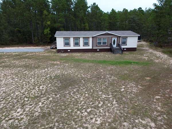 10.7 Acres of Land with Home for Sale in Gibson, Georgia