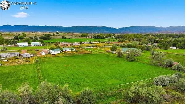 2.87 Acres of Land with Home for Sale in Florence, Colorado
