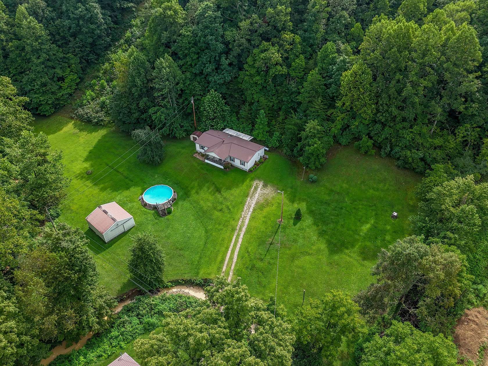 21 Acres of Land with Home for Sale in Olive Hill, Kentucky