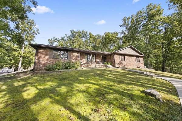 20.8 Acres of Land with Home for Sale in Louisa, Kentucky