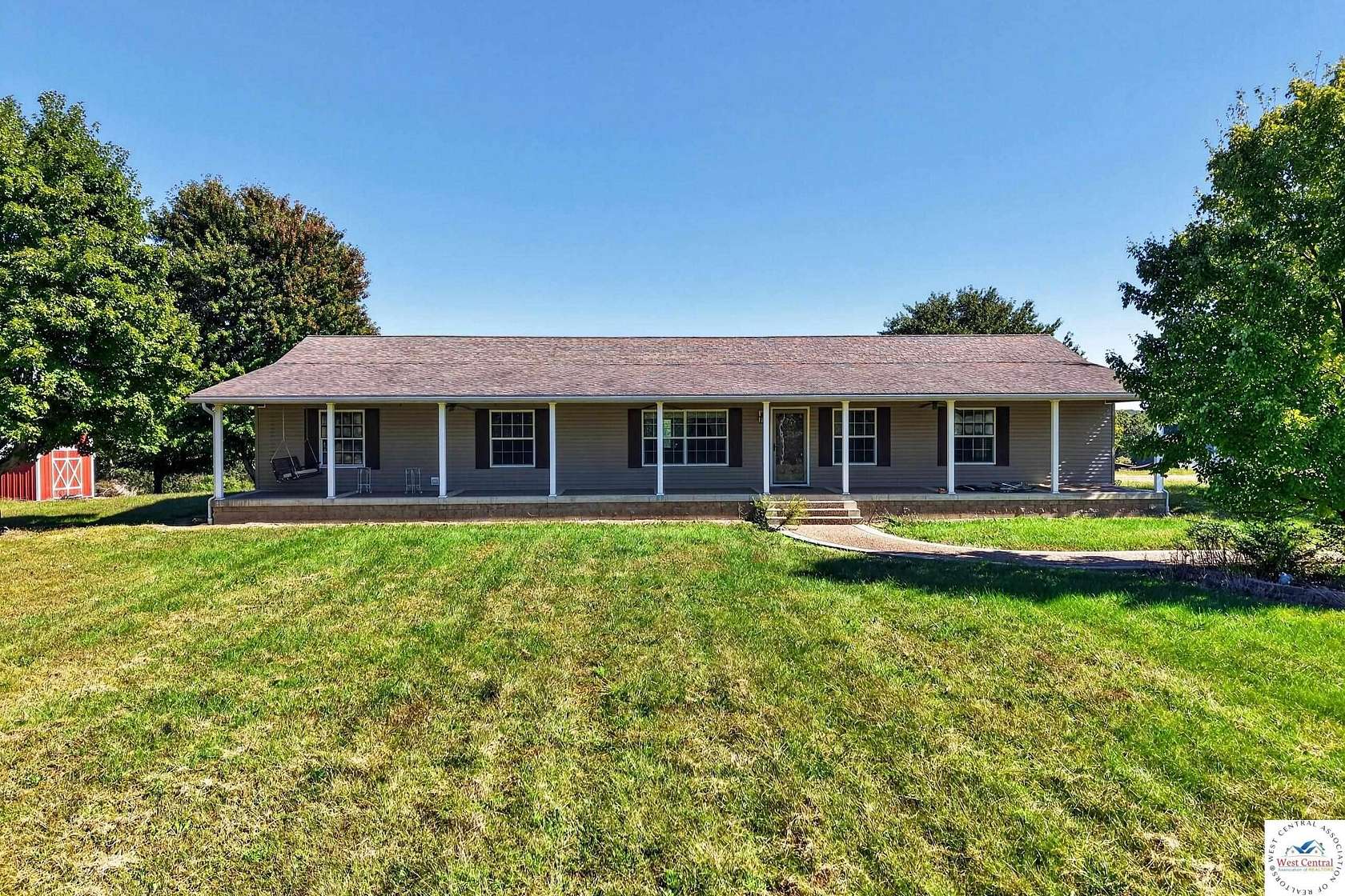 143 Acres of Agricultural Land with Home for Sale in Stover, Missouri