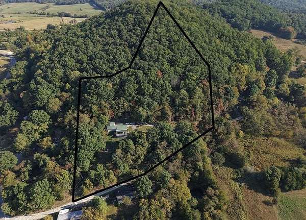 7 Acres of Land with Home for Sale in Hillsboro, Kentucky