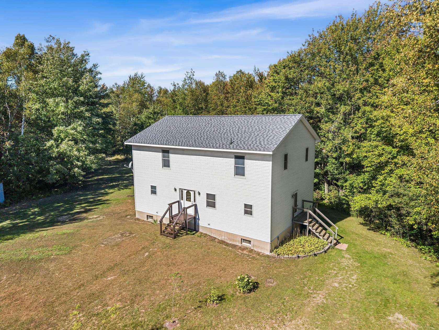 50 Acres of Recreational Land with Home for Sale in Carp Lake, Michigan